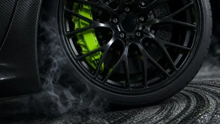 Black wheel, lime caliper, smoke and tyre marks